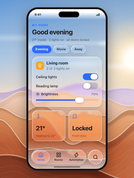Phone smart-home dashboard over full-bleed dunes: flat greeting and home summary, scene chips with one solid selected chip, a glass room card with two switches and a brightness slider, thermostat and door-lock widgets, and a floating tab bar with a separate search lens.